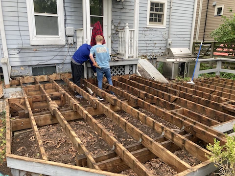 Volunteers installing new deck boards